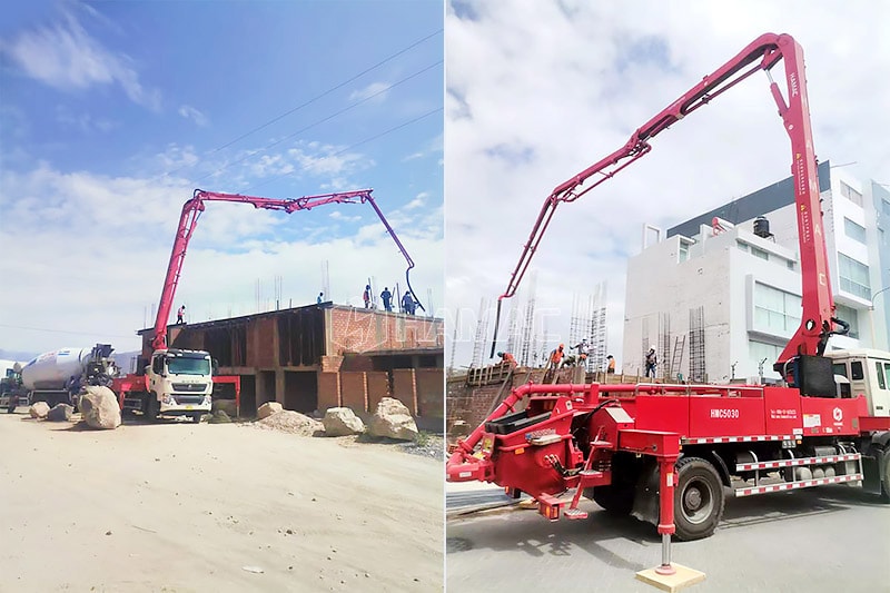 HMC5030 Truck mounted concrete boom pump is delivering concrete for a small building. 
