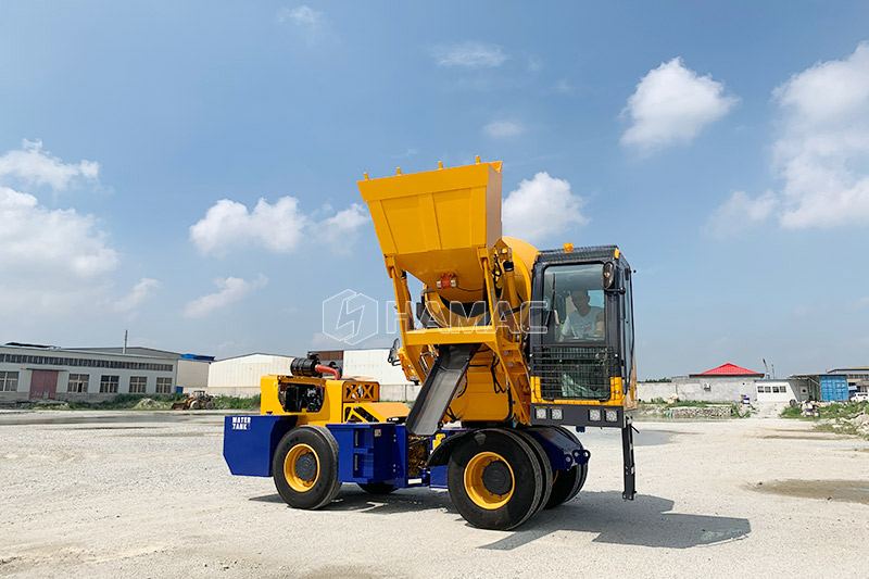 How does a self-loading concrete mixer work? 