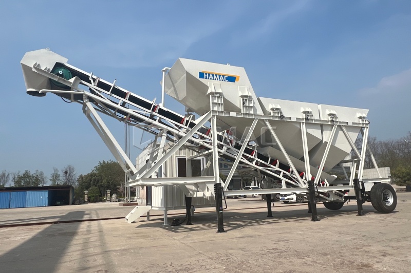Dry type mobile batching plant set up beside a highway