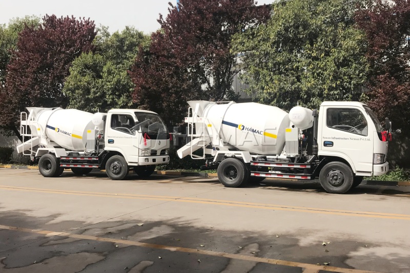 Four concrete mixer trucks ready for tunnel works in Nepal